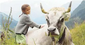  ??  ?? Junge Tierschütz­erin: Bergbauern­kind Lisa aus Tux in Tirol