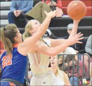  ?? RICK PECK/ SPECIAL TO MCDONALD COUNTY PRESS ?? McDonald County’s Kristin Penn gets fouled while attempting a layup during the Lady Mustangs’ 70-31 win over Springfiel­d Hillcrest on Jan. 4 at MCHS.