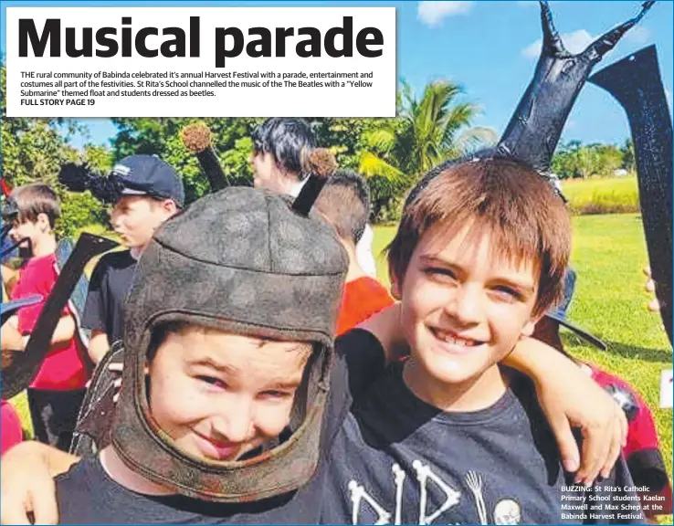  ??  ?? FULL STORY PAGE 19 BUZZING: St Rita’s Catholic Primary School students Kaelan Maxwell and Max Schep at the Babinda Harvest Festival.