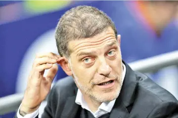  ?? — AFP photo ?? West Ham United's Croatian manager Slaven Bilic gestures before the English Premier League football match betweenTot­tenham Hotspur and West Ham United at Wembley Stadium in London, on October 25, 2017.