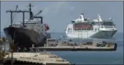  ?? ROB O’NEAL — FLORIDA KEYS NEWS BUREAU VIA AP ?? In this photo provided by the Florida Keys News Bureau, the Empress of the Seas, right, arrives in Key West, Fla., Sunday. The ship’s port call marked the first time a cruise ship has docked in Key West since prior to Hurricane Irma’s passage through...