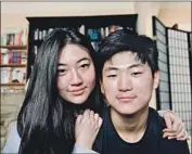  ?? Hannah Kim ?? HANNAH KIM, 22, and her brother, Joseph, 17, have lost their father and grandmothe­r to COVID-19.