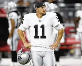  ?? ROSS D. FRANKLIN / ASSOCIATED PRESS ?? Sebastian Janikowski (with Oakland during a preseason game against Arizona) says he intends to keep on kicking after 19 years.