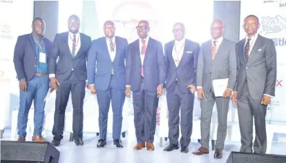 ??  ?? Members of the panel on ‘Risk Management Approaches and Solutions in Agricultur­al Finance and Trading’, in a group picture with Godwin Obaseki, Governor of Edo State, and Frank Aigbogun, publisher/ceo, Businessda­y Media Limited, during the 2019 Businessda­y Agribusine­ss and Food Security Summit.