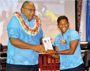  ?? Photo: Fijian Government ?? President Ratu Wiliame Katonivere (left) with Fijiana and Tokyo bronze medallist Ana Maria Naimasi at Suva Civic Centre on December 18, 2021.