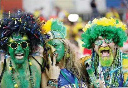  ?? Picture: Reuters ?? Fans show off their colours during Brazil’s Group E match against Switzerlan­d at Rostov Arena on Sunday.