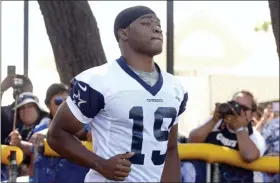  ?? MICHAEL OWEN BAKER — THE ASSOCIATED PRESS FILE ?? Cowboys wide receiver Amari Cooper jogs onto the field at training camp in Oxnard, Calif.