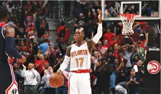  ?? AFP ?? DENNIS SCHRODER of the Atlanta Hawks celebrates during Game Four of their 2017 Eastern Conference Quarterfin­als on April 24 at Philips Arena in Atlanta, Georgia.