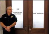  ?? Arkansas Democrat-Gazette/BENJAMIN KRAIN ?? A Pulaski County sheriff’s deputy blocks anyone from entering court Wednesday after the start of opening arguments in the trial of Arron Lewis.