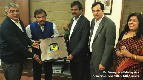  ??  ?? Dr. Guruprasad Mohapatra, Chairman, AAI with GRIHA Award