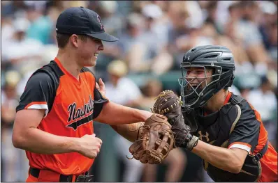  ?? NWA Democrat-Gazette/BEN GOFF ?? Nashville catcher Colton Patterson (right) congratula­tes Scrappers pitcher Tyler Hanson after an out to end the third inning Saturday in the Class 4A baseball championsh­ip at Baum Stadium in Fayettevil­le. Hanson pitched a shutout in a 4-0 victory over...