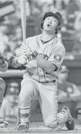  ?? Chris Szagola / Associated Press ?? Nori Aoki goes down swinging as a pinch hitter in the fifth inning, one of 13 strikeouts for the Astros during Wednesday night’s loss.