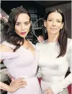  ?? GETTY IMAGES ?? Hannah John-Kamen, left, and Evangeline Lilly are friendly at the Hollywood première of Ant-Man and the Wasp, but they’re adversarie­s on screen.