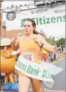  ??  ?? The first women to cross the finish line, Bridgid Selfors, placed 17th overall in the Middletown Citizens Bank 5K Summer Fun Run, running 19:04 in 2014.