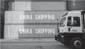  ?? Stephen B. Morton / Associated Press ?? An internatio­nal postal treaty allows China to ship packages to America at discounted rates. President Donald Trump reportedly wants it renegotiat­ed.