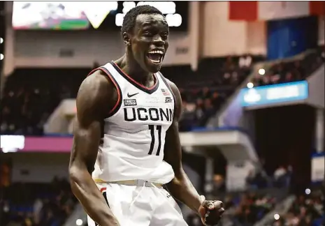  ?? Jessica Hill / Associated Press ?? Akok Akok’s energy and enthusiasm made him a popular player in Storrs. He announced last week that he is transferri­ng from UConn.