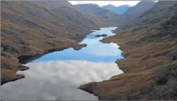  ??  ?? View over Loch Beoraid, South Morar, which Neil first explored 39 years ago
Pictures