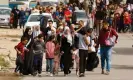  ?? ?? People fleeing the north on 12 November. Photograph: Ibraheem Abu Mustafa/ Reuters