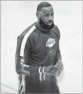  ?? HARRY HOW GETTY IMAGES ?? This weekend at the All-Star game, LeBron James will be pushing his More Than A Vote organizati­on.