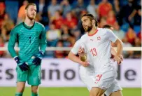  ?? AFP ?? Switzerlan­d’s defender Ricardo Rodriguez (right) celebrates a goal beside a dejected Spain goalkeeper David de Gea. —