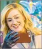  ?? Katherine Bomboy Hallmark ?? KELLY PICKLER stars in the music-filled holiday movie “Christmas at Graceland” on Hallmark.