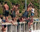  ??  ?? Jumping from the Paremata Bridge has been a tradition for Porirua’s young people.