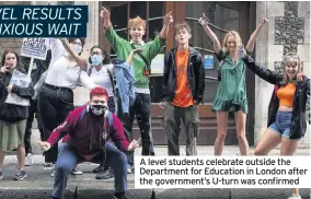  ??  ?? A level students celebrate outside the Department for Education in London after the government’s U-turn was confirmed