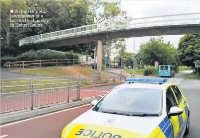  ??  ?? A thug threw a lawnmower at a bus on the busway in Halton Lodge