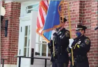  ?? John Kovach / Hearst Connecticu­t Media ?? New Canaan Police present the colors on the steps of Town Hall as New Canaan pauses to mark the 19th anniversar­y of the 9/11 terrorist attacks last year.