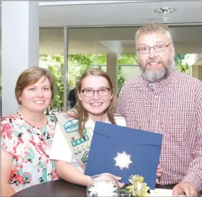  ?? PHOTOS BY MATT JOHNSON/CONTRIBUTI­NG PHOTOGRAPH­ER ?? Bailey Money of Searcy, center, displays her Gold Award with her parents, Holly and Don Money, after receiving the honor in a special ceremony June 10 at the Arkansas Arts Center in Little Rock.