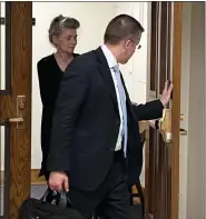  ?? PHOTO BY CARL HESSLER JR. ?? Elizabeth Anne Gramlich, 60, of Abington, leaves a Montgomery County courtroom with her lawyer Jason Kadish after she pleaded guilty to charge she neglected her younger brother who had Down syndrome.