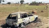  ??  ?? A car was also burnt by angry villagers who went on the rampage