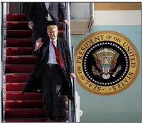  ?? AP/KEVIN WOLF ?? President Donald Trump disembarks from Air Force One on Sunday at Andrews Air Force Base in Maryland. Trump later pushed for the media to divulge the identity of the whistleblo­wer, telling reporters at the White House that “you’d be doing the public a service if you did.”