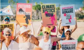  ?? Photograph: Roëlton Thodé/Greenpeace ?? Residents of Bonaire, together with Greenpeace Netherland­s and allies, stand up for climate justice.