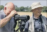  ?? PICTURES: TOM STREETER AND CHARLES SAINSBURY-PLAICE. ?? Above left, Prince Charles discusses plans to bring about a recovery in numbers of curlew, top, at a Duchy of Cornwall site on Dartmoor pre-lockdown; above right, a staff member and a farmer looking for curlews.