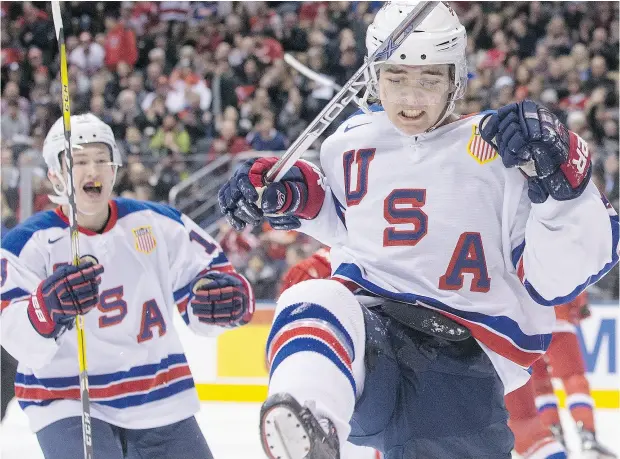  ?? CHRIS YOUNG / THE CANADIAN PRESS FILES ?? Team USA’s Clayton Keller is shown celebratin­g a goal during the world junior hockey championsh­ip in Toronto. Keller is hoping to make a big impression with the Arizona Coyotes as a rookie this season.
