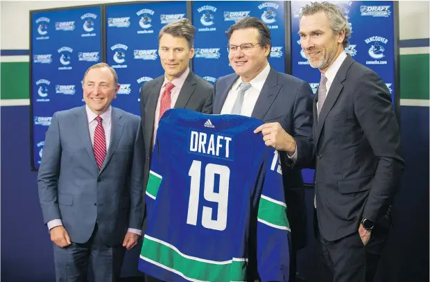  ?? ARLEN REDEKOP/PNG FILES ?? NHL commission­er Gary Bettman, from left, Vancouver Mayor Gregor Robertson, Canucks owner Francesco Aquilini and Trevor Linden announce the 2019 NHL Entry Draft in February. Linden’s team missed the playoffs in three of the past four seasons.