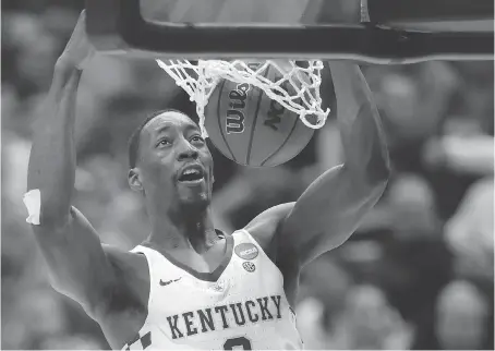  ?? JEFF ROBERSON/THE ASSOCIATED PRESS ?? Kentucky’s Bam Adebayo dunks the ball during the second half of his team’s second-round game against Wichita State on Sunday in Indianapol­is. Adebayo had 13 points and 10 rebounds as the Kentucky Wildcats won 65-62 to move on to the Sweet 16.