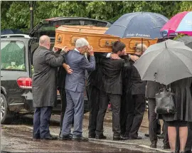  ??  ?? The remains of Philip Leahy arriving at the Church of the Navivity in Ballyholle­y ahead of his funeral mass last Monday. Photo: John Delea.