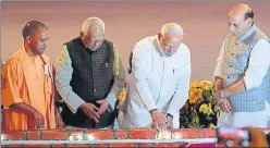  ?? SUBHANKAR CHAKRABORT­Y/HT PHOTO ?? ▪ Prime Minister Narendra Modi laying the foundation stone of projects worth ₹60,000 crore at the Ground Breaking Ceremony in the presence of union home minister Rajnath Singh, governor Ram Naik and chief minister Yogi Adityanath, in Lucknow on Sunday.