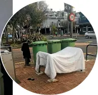  ?? CAMERON BURNELL/STUFF ?? Homeless people are taking to high profile Courtenay Place to illustrate their plight. Left: Daniel Lowhon lives rough on the streets. Below: Washing is hung out in the inner-city.