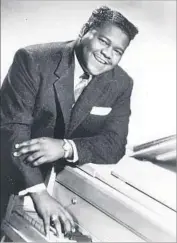  ?? EMI ?? ANTOINE “FATS” DOMINO changed popular music with his pounding piano and easy baritone.