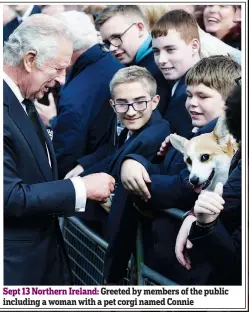  ?? ?? Sept 13 Northern Ireland: Greeted by members of the public including a woman with a pet corgi named Connie