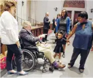  ?? MARK BURNS/OFFCE OF GEORGE H.W. BUSH/POOL VIA AP FORMER ?? Former President George H.W. Bush greets mourners with his daughter, Dorothy “Doro” Bush Koch, during the visitation Friday for former first lady Barbara Bush at St. Martin’s Episcopal Church in Houston.