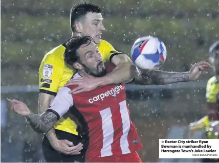  ?? Steve Bond/Pinnacle ?? Exeter City striker Ryan Bowman is manhandled by Harrogate Town’s Jake Lawlor