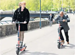  ?? ?? Trail of success: during PMQS, top, campaignin­g in Oldham in 2016, below left, and with Bristol mayor Marvin Rees