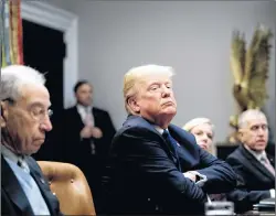  ?? AP PHOTO ?? U.S. President Donald Trump listens during a meeting with Republican Senators on immigratio­n in the Roosevelt Room at the White House Thursday in Washington.