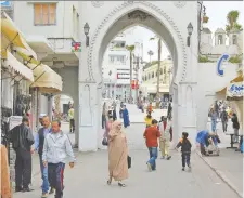  ?? RICK STEVES ?? A gate in Tangier's old town reveals an amazing city that has been restored and revived. It is best toured with a private guide to take in rooftop tea houses and avoid tourist traps.