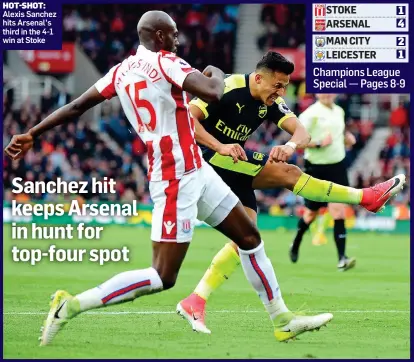  ??  ?? Alexis Sanchez hits Arsenal’s third in the 4-1 win at Stoke Sanchez hit keeps Arsenal in hunt for top-four spot HOT-SHOT: