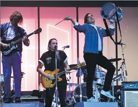  ?? FRED TANNEAU/AFP/GETTY IMAGES ?? Arcade Fire and other musicians say they earn less from YouTube than other streaming sites.